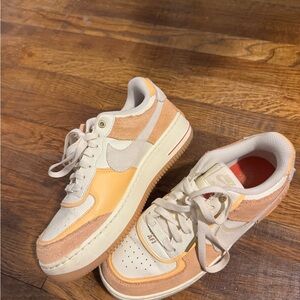 Nike Low-Top Sneakers in Peach & Cream